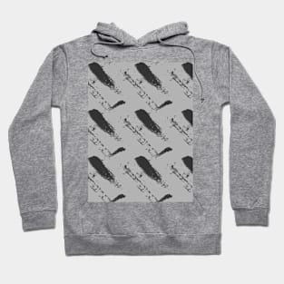 Black strokes and spots on a gray background, abstraction Hoodie